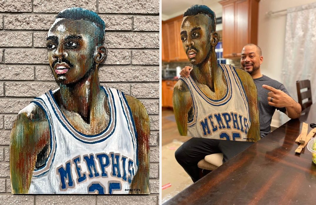 Hand-cut and hand-painted portrait of a Memphis basketball player, number 25, in a white and blue jersey: on a brick wall, and held by a smiling customer in a kitchen